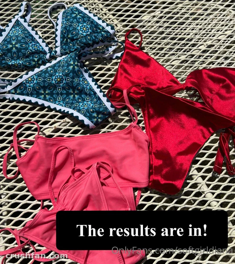 Teal, red and pink swimwear arranged on a light woven surface.