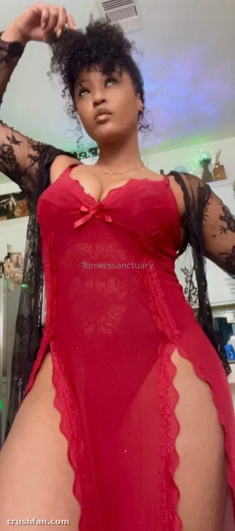 Turnerssanctuary in a red sheer lace nightdress with a black lace robe indoors